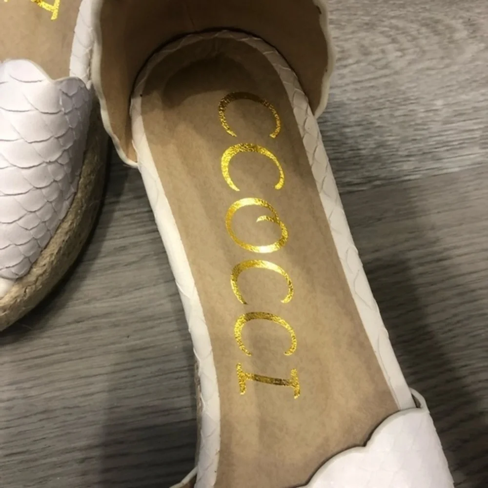 Coccoli white leather